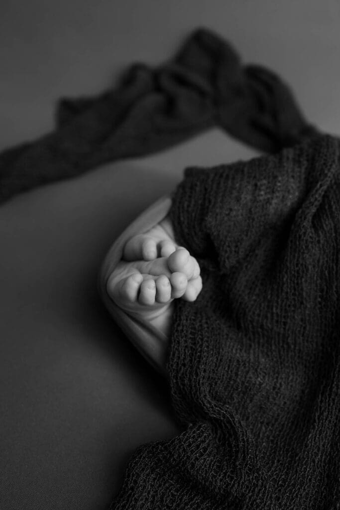 Babies feet wrapped in cloth for detail photography